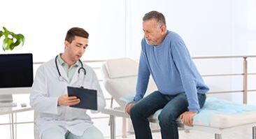 a doctor talking to a patient