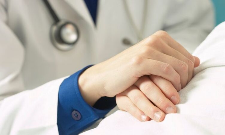 a doctor cares for a patient with prostatitis